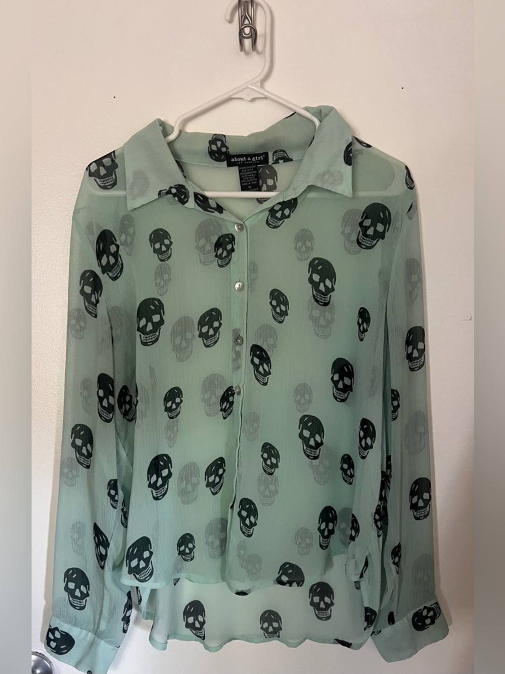 About A Girl Mint Green Sheer Blouse with Black Skull Print